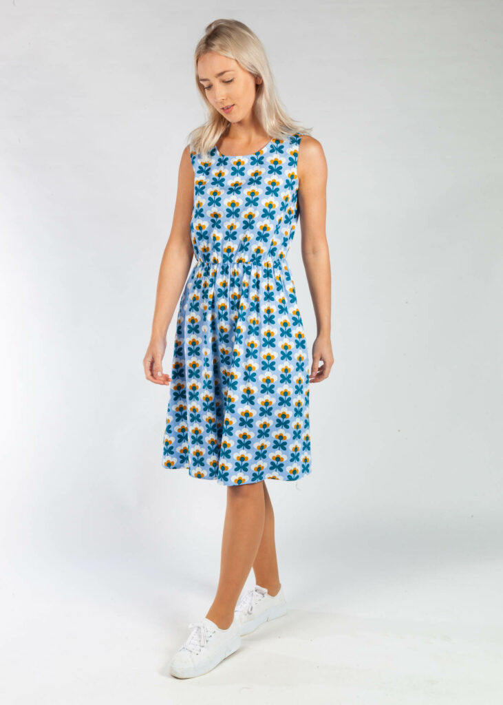 The Nova is a brand new shape and will be your new go-to summer dress! It has a gorgeous relaxed shape that is so easy to wear. We designed this classic dress for everyday wear with an elasticated waist for added comfort. The vintage inspired Nova boasts a refreshing floral print on a sky blue cotton base for a vibrant, retro look.